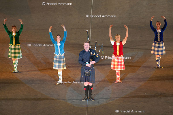 KULTUR - Basel Tattoo - Captain Stuart D Samson MBE, Lone Piper - South Africa Highland Dancers